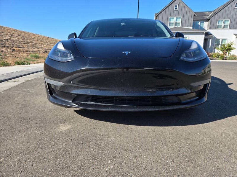 tesla model 3 2021 5YJ3E1EA6MF017916 image tesla model 3 2021 5YJ3E1EA6MF017916 image